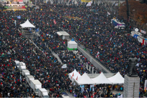 Güney Kore'de on binler devlet başkanının istifası için sokaklarda