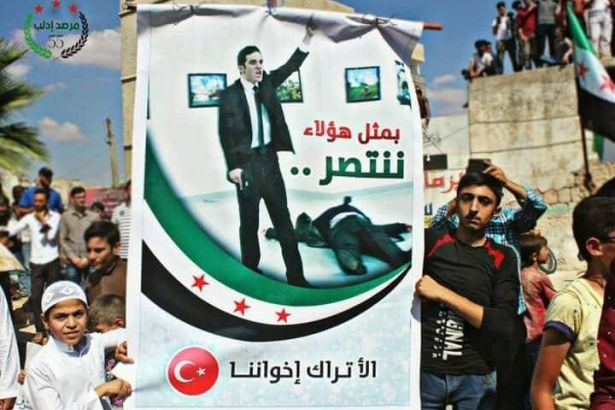 İdlib'deki cihatçılar Karlov'un katilinin posterini taşıdı 