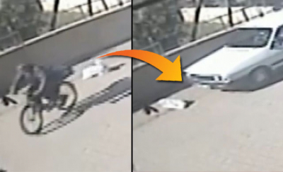 Adana'da bisikletlinin yola attığı torbadaki köpeği otomobil ezdi 