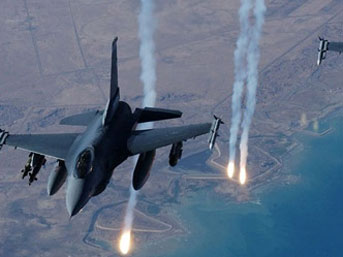 Irak uçakları Musul ve Tikrit'i bombalıyor!